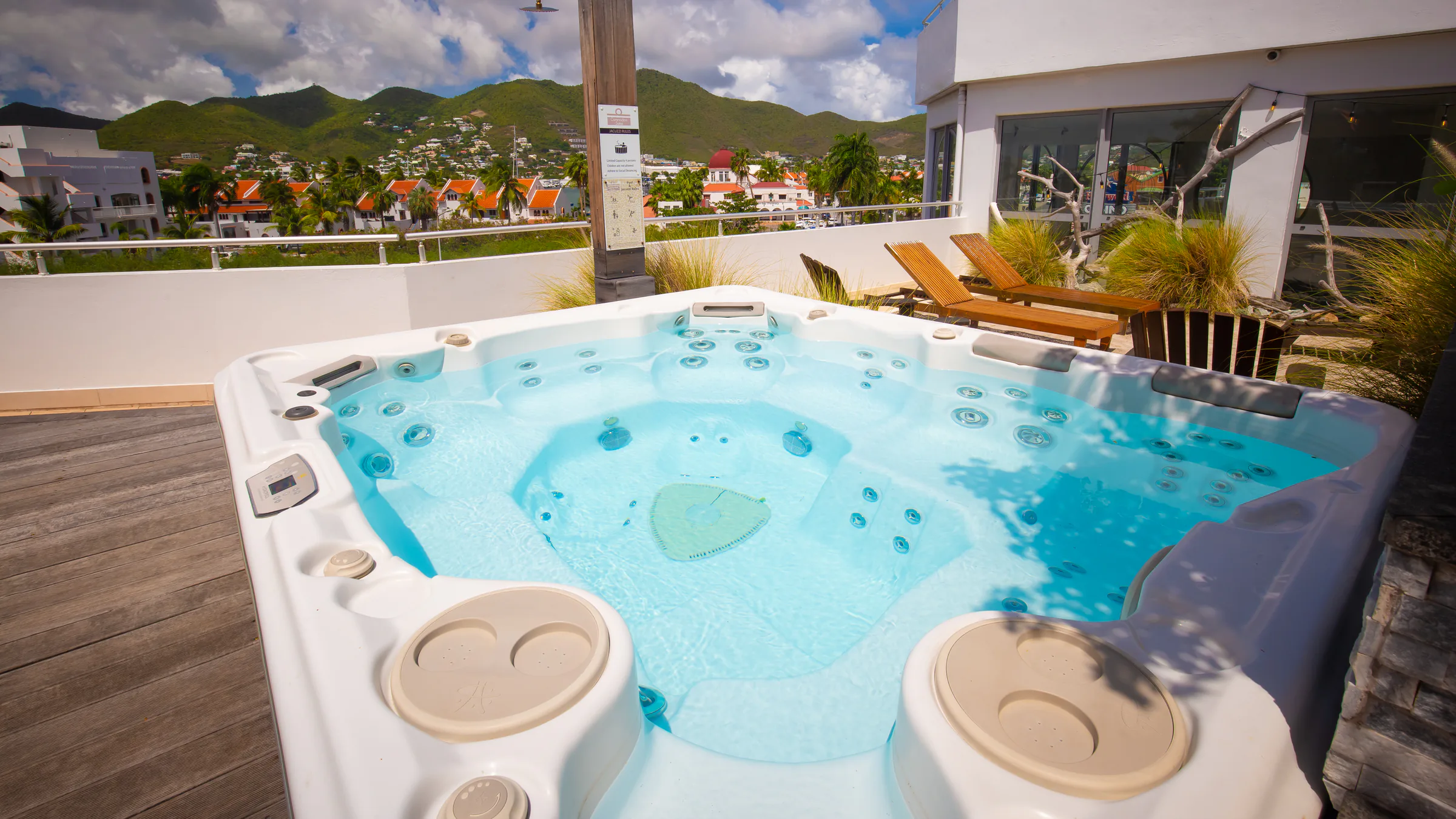 Rooftop hot tub overlooking the hills of St. Maarten.